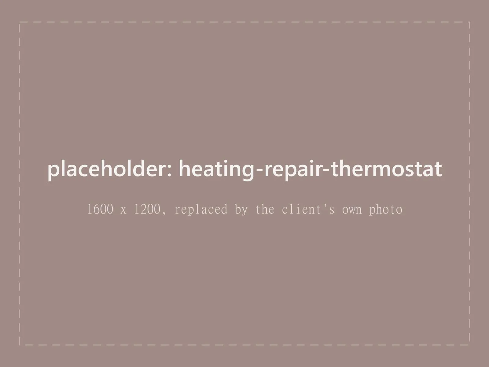 Wall thermostat showing a heat call, technician checking wiring behind it